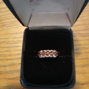 New s.925 sterling silver garnet ring size 7 with Diamond Accents